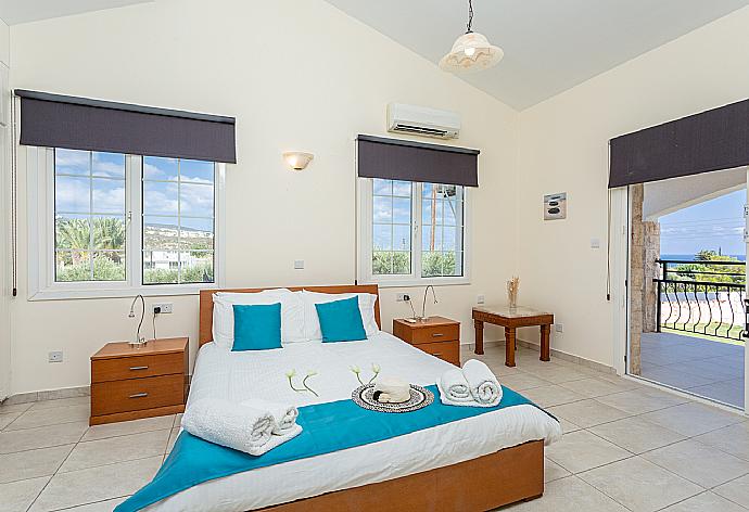 Double bedroom with en suite bathroom and A/C . - Villa Thea . (Photo Gallery) }}