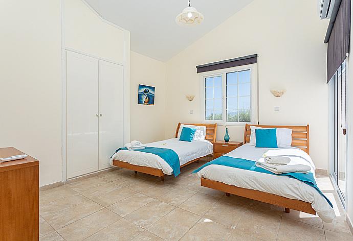 Twin bedroom with A/C . - Villa Thea . (Photo Gallery) }}