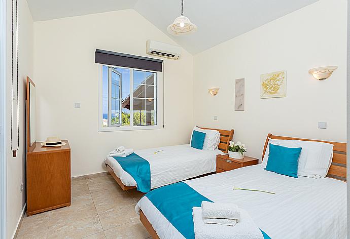 Twin bedroom with A/C . - Villa Thea . (Photo Gallery) }}