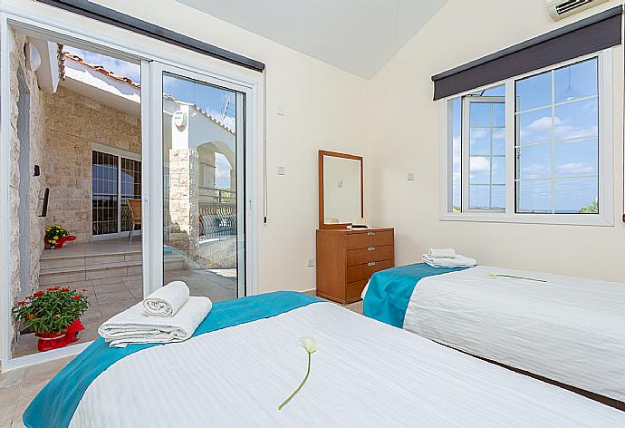 Twin bedroom with A/C . - Villa Thea . (Photo Gallery) }}