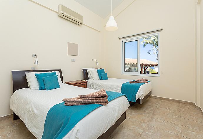 Twin bedroom with A/C . - Villa Amorosa . (Photo Gallery) }}