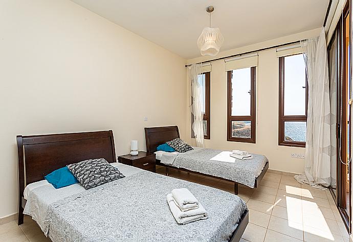 Twin bedroom with A/C and terrace access with sea views . - Villa Mermaid . (Photo Gallery) }}