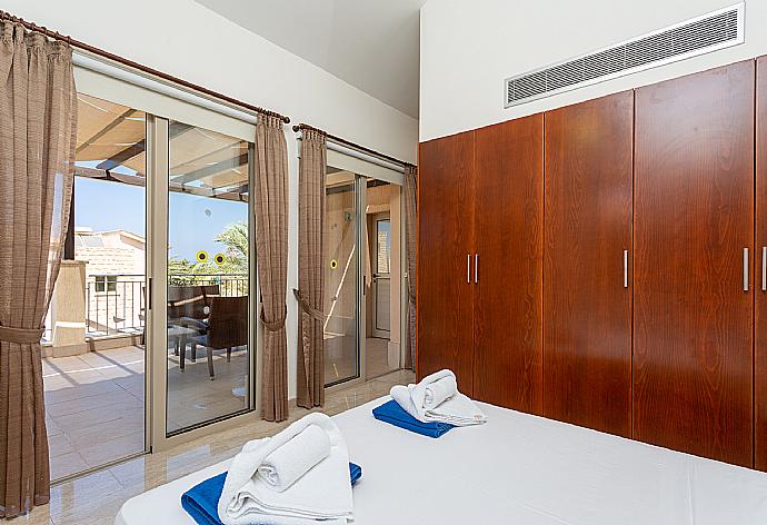 Double bedroom with en suite bathroom, A/C, and upper terrace access . - Villa Diana . (Photo Gallery) }}