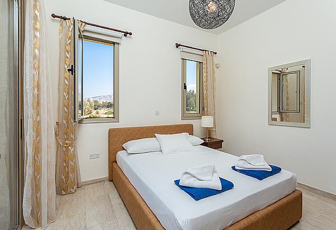 Double bedroom with en suite bathroom and A/C . - Villa Diana . (Photo Gallery) }}