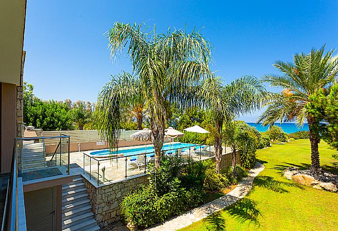 Private infinity pool, terrace, and garden with sea views . - Villa Galene . (Photo Gallery) }}