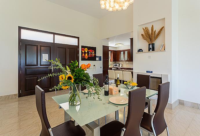 Open-plan living room with sofas, dining area, kitchen, ornamental fireplace, A/C, WiFi internet, satellite TV, and sea views . - Villa Galene . (Photo Gallery) }}