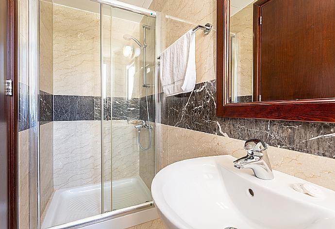 En suite bathroom with shower . - Villa Galene . (Photo Gallery) }}