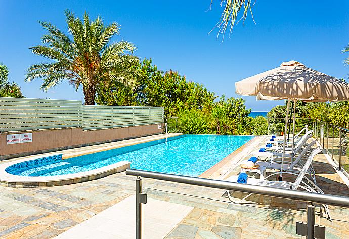Private infinity pool, terrace, and garden with sea views . - Villa Galene . (Photo Gallery) }}