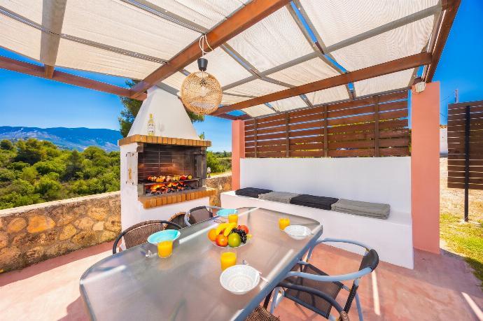 Sheltered terrace area with BBQ . - Villa Europe Ena . (Photo Gallery) }}