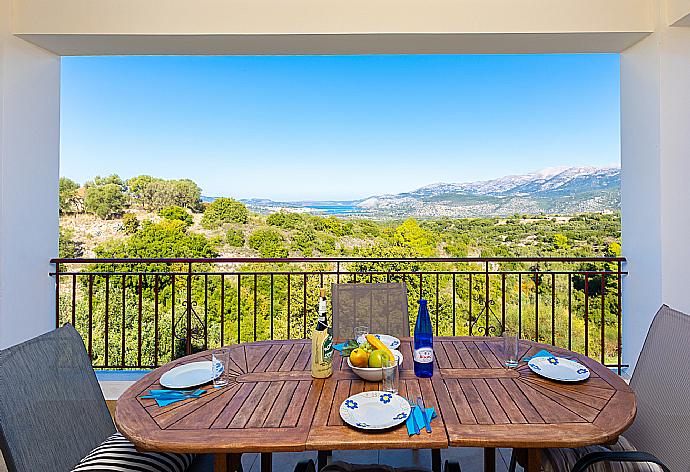 Sheltered terrace area with panoramic views . - Villa Europe Thia . (Photo Gallery) }}