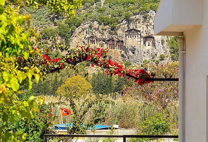 View of ancient Lycian rock tombs as seen from villa . - Villa Zonkdemir . (Photo Gallery) }}