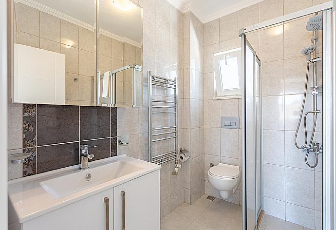 En suite bathroom with shower . - Villa Toprak . (Photo Gallery) }}