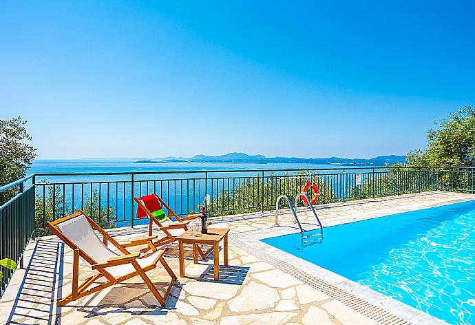 Private pool and terrace with panoramic sea views . - Villa Ilios . (Photo Gallery) }}