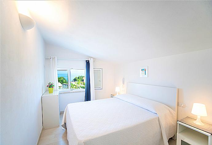 Double bedroom with A/C . - Villa Orchidea . (Photo Gallery) }}