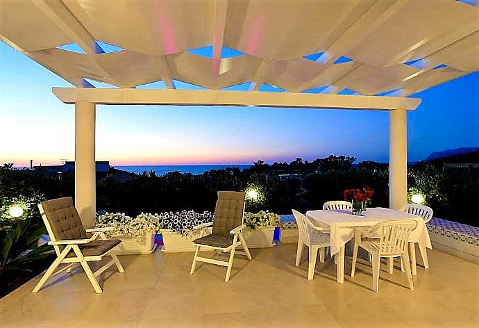 Terrace area with sea views . - Villa Orchidea . (Photo Gallery) }}