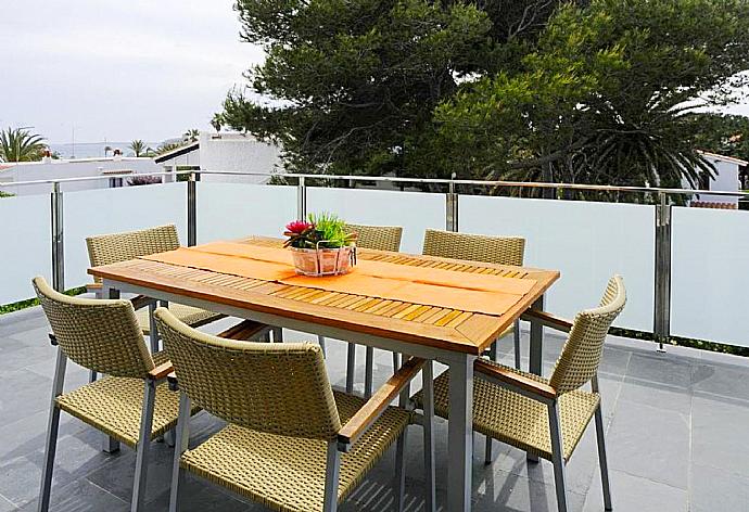 Upper terrace area with sea views . - Villa Can Paco . (Photo Gallery) }}