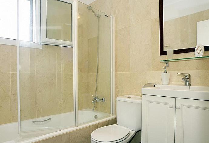 Family bathroom with bath and shower . - Villa Can Paco . (Photo Gallery) }}