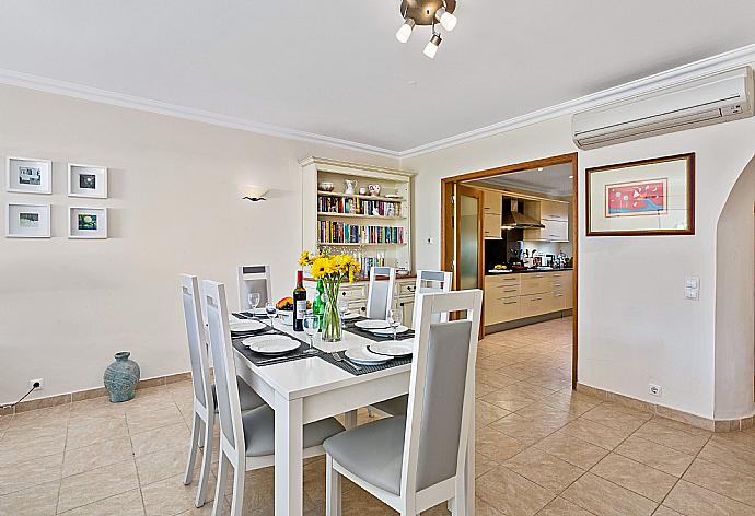 Equipped kitchen and dining area . - Villa Oceano . (Photo Gallery) }}