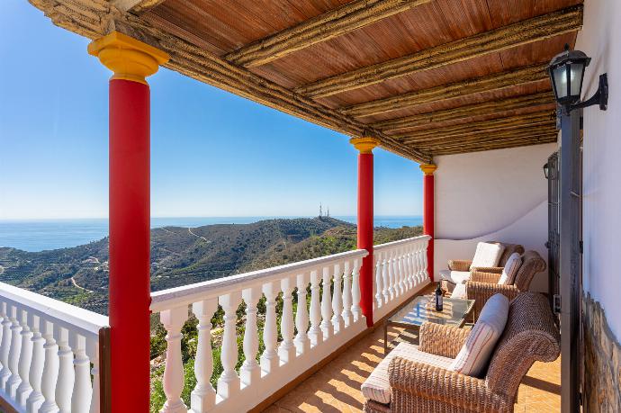 Sheltered terrace area with sea views . - Villa Cortijo Martin . (Photo Gallery) }}