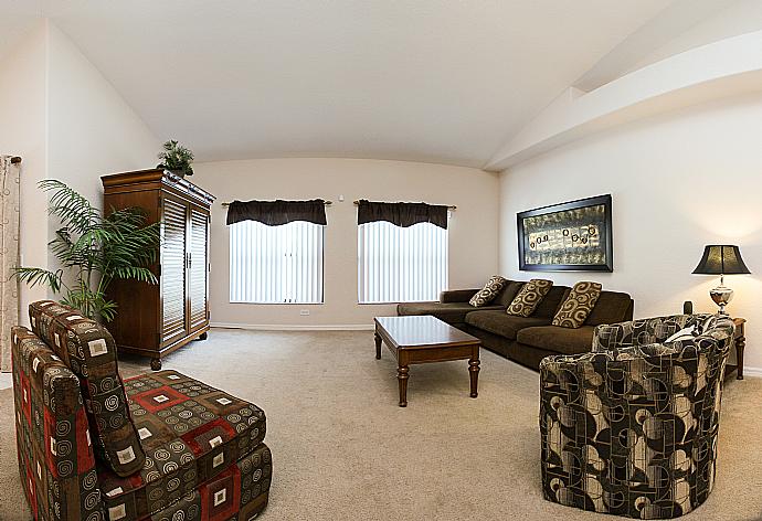 Open-plan living room with equipped kitchen and dining area. . - Villa Springfield . (Galerie de photos) }}