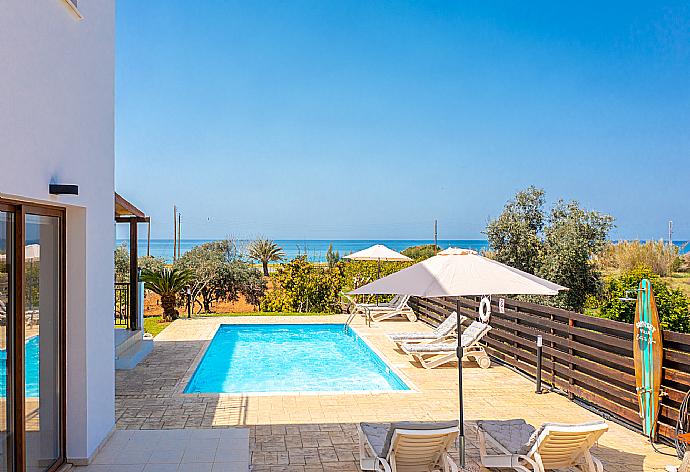 Private pool, terrace, and garden with panoramic sea views . - Villa Sunset . (Галерея фотографий) }}