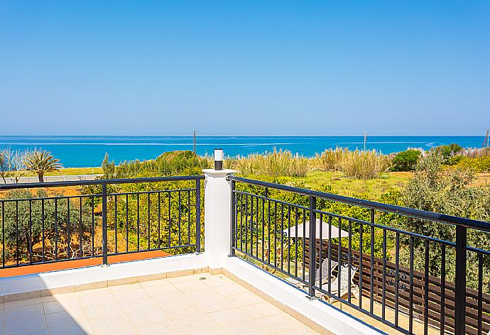 Upper terrace with sea views  . - Villa Sunset . (Photo Gallery) }}