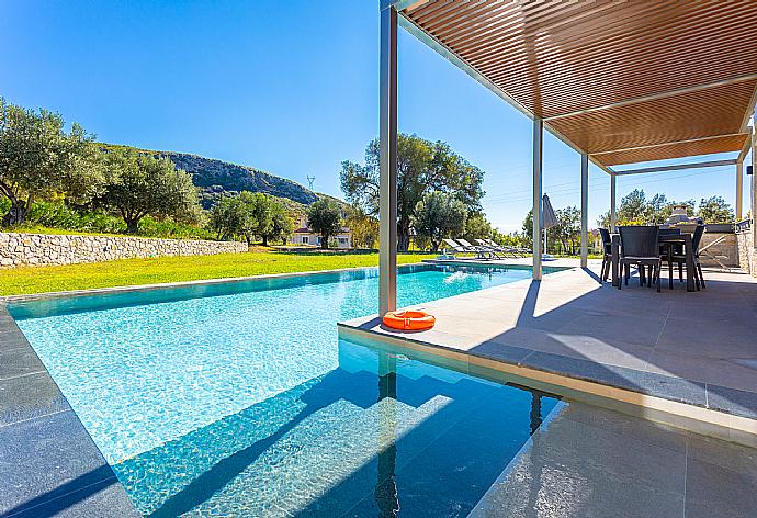 Private pool and terrace . - Villa Ersi . (Photo Gallery) }}