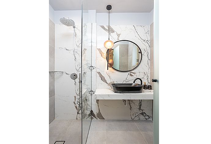 En suite bathroom with shower . - Villa Ersi . (Photo Gallery) }}