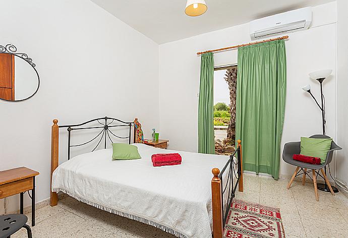 Double bedroom with A/C . - Yiangos House . (Photo Gallery) }}