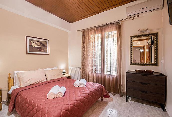 Double bedroom with A/C and TV . - Villa Michael . (Photo Gallery) }}