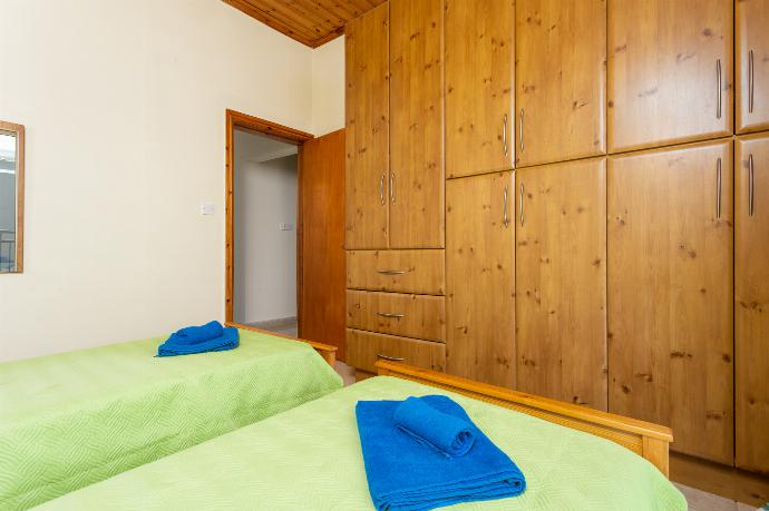 Twin bedroom on first floor with A/C and balcony access . - Villa Solon . (Галерея фотографий) }}