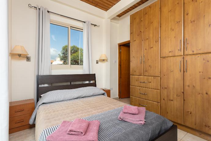 Double bedroom with en suite bathroom, A/C, and balcony access . - Villa Aristotle . (Photo Gallery) }}