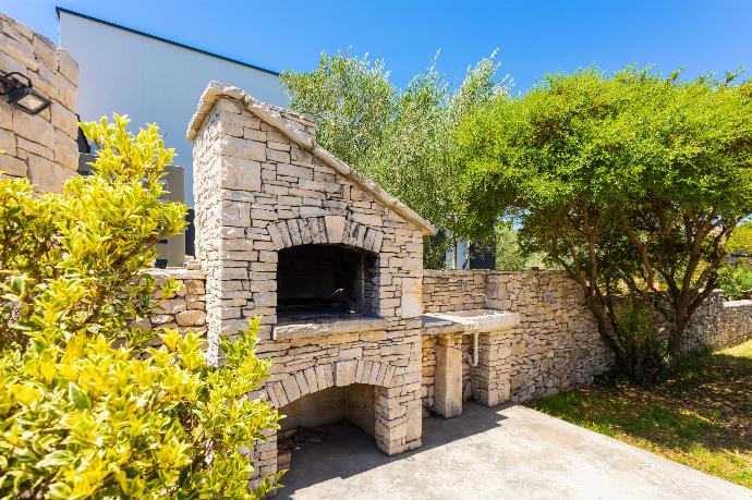 BBQ area . - Villa Krnica . (Fotogalerie) }}