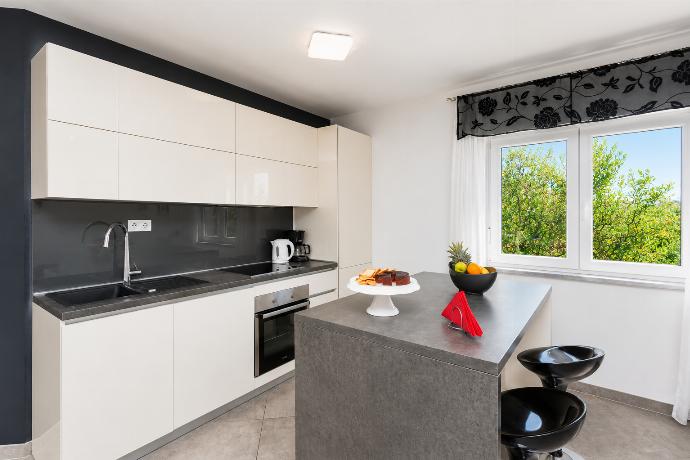 Equipped kitchen . - Villa Krnica . (Photo Gallery) }}