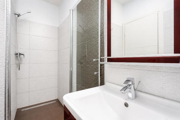 En suite bathroom with shower . - Villa Krnica . (Photo Gallery) }}