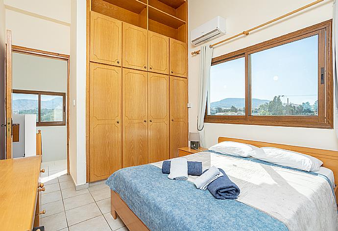 Double bedroom with A/C, sea views, and balcony access . - Blue Bay Villa Nicole . (Галерея фотографий) }}