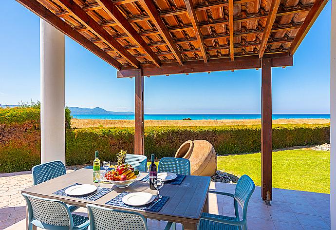 Sheltered terrace area with sea views . - Blue Bay Villa Thea . (Galería de imágenes) }}