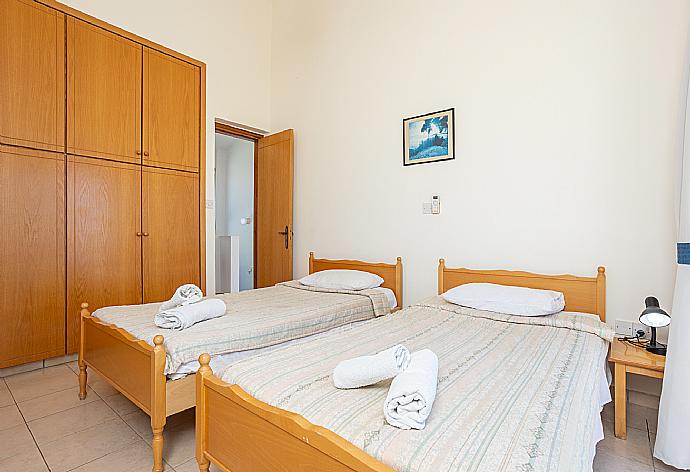 Twin bedroom with A/C, sea views, and balcony access . - Blue Bay Villa Dimitris . (Photo Gallery) }}