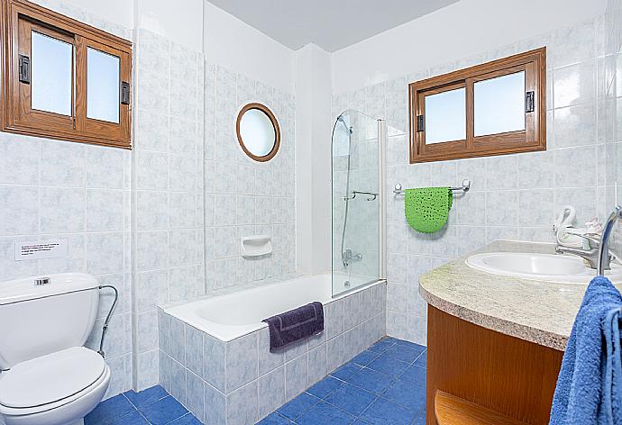 Family bathroom with bath and shower . - Blue Bay Villa Dimitris . (Photo Gallery) }}