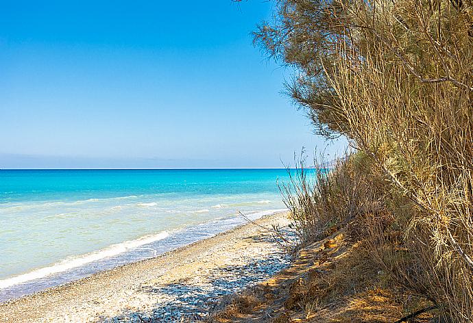 Beach directly in front of Blue Bay Villa Dimitris . - Blue Bay Villa Dimitris . (Photo Gallery) }}