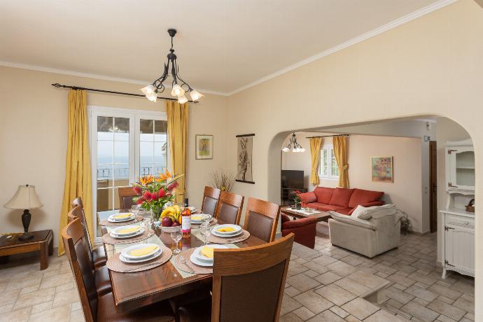 Dining room on first floor with sea views and balcony access . - Ioannas House . (Photo Gallery) }}