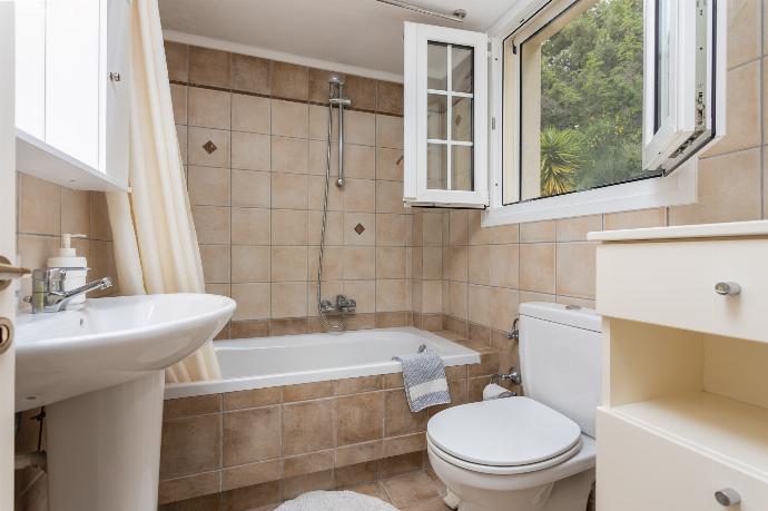 Family bathroom on second floor with bath and shower . - Ioannas House . (Галерея фотографий) }}