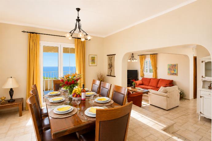 Dining room on first floor with sea views and balcony access . - Ioannas House . (Photo Gallery) }}