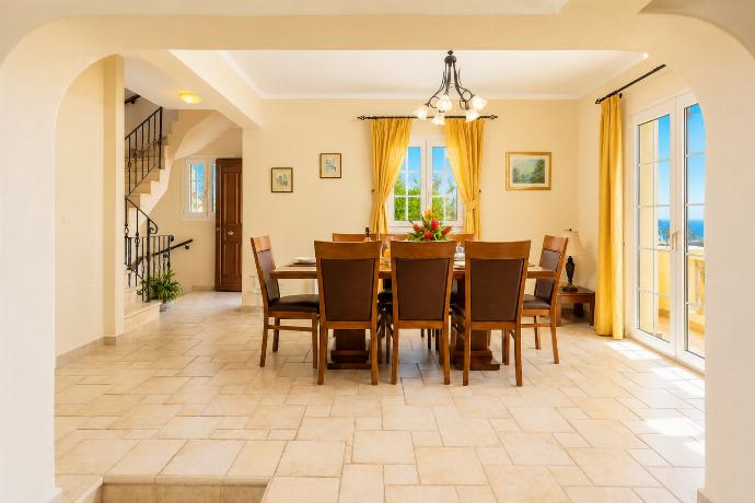 Dining room on first floor with sea views and balcony access . - Ioannas House . (Photo Gallery) }}