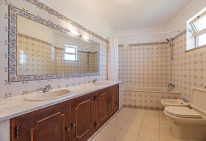 Bathroom with bath and toilet  . - Villa Natalia . (Galería de imágenes) }}