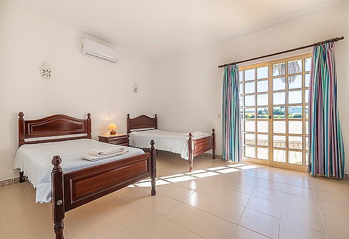 Twin room with A/C . - Villa Natalia . (Photo Gallery) }}