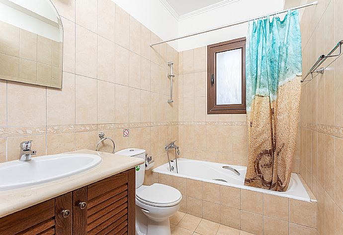 Family bathroom with bath and shower . - Villa Dora . (Photo Gallery) }}