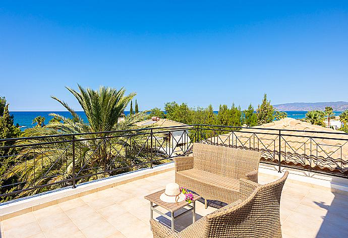 Roof terrace area with sea views . - Villa Iliana . (Photo Gallery) }}