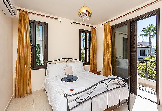 Double bedroom with A/C . - Villa Iliana . (Photo Gallery) }}