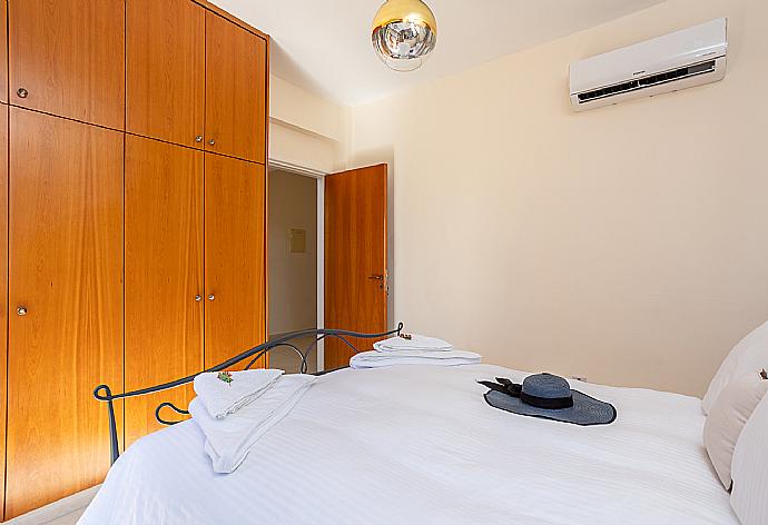 Double bedroom with A/C . - Villa Iliana . (Photo Gallery) }}